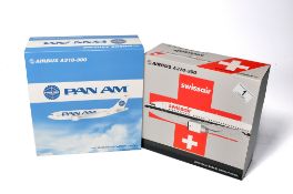 A duo of diecast model aircraft 1/200 scale issues comprising 1) Swissair Airbus A310-300, 2) Pan Am