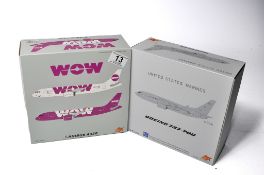 A duo of diecast model aircraft 1/200 scale issues comprising 1) FOX United States Marines Boeing