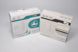 A duo of diecast model aircraft 1/200 scale issues comprising 1) JC Wings Luxair Boeing 737-500,