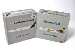 A duo of diecast model aircraft 1/200 scale issues comprising 1) FOX Thomas Cook Airbus A320, 2)