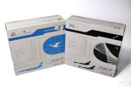 A duo of diecast model aircraft 1/200 scale issues comprising 1) JC Wings XiamenAir Boenig 737 Max