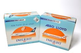 A duo of diecast model aircraft 1/200 scale issues comprising 1) Inflight 200 Aero Lloyd McDonnell