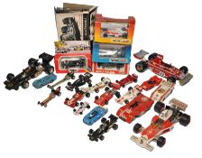 A group of boxed Polistil diecast racing cars in addition to a quantity of loose unboxed issues from