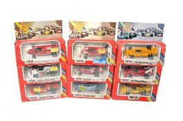 A selection of boxed diecast model racing cars from Ertl, Yaxon and Polistil. Generally very good to