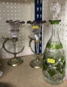 A pair of 19th Century Bohemian amethyst glass trumpet shaped epergnes on cast brass exotic bird