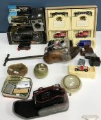 A box containing a Colibri onyx table lighter, together with a similar ashtray,