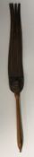 A late 19th Century beech-handled leather tawe (strap),