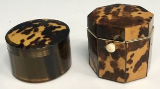 A 19th Century tortoiseshell dome top two section tea caddy, the lid and base with ivory linings,