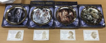 A collection of four Lord of the Rings characters collectors plates, limited edition,
