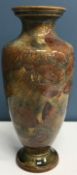 A Doulton Lambeth baluster vase with leaf decoration,