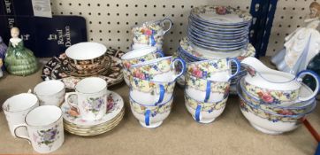 A vintage Aynsley Dorothy B944 floral decorated part tea set comprising two various sugar bowls,