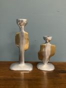 A graduated pair of David Marshall aluminium and brass candlesticks of organic form bearing labels