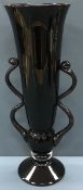 A mid to late 20th Century speckled black glass vase of trumpet form with snake type open work