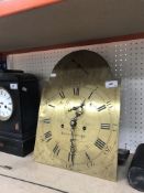A 19th Century long case clock face and mechanism,