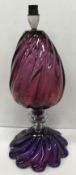 A mid 20th Century glass table lamp of pink and purple swirling form in the Murano style,