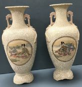 A pair of early 20th Century Japanese Satsuma vases with figural panel decoration,