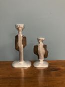 A graduated pair of David Marshall aluminium and bronze candlesticks of organic form bearing labels
