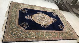A Persian carpet, the central panel set