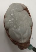 A Chinese carved bi-colour hard stone fi