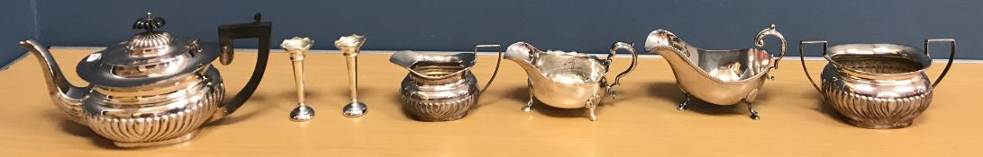 A pair of silver trumpet shaped spill va