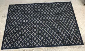 A modern machine woven carpet with cream