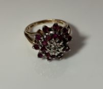 A 9 carat gold mounted ruby and diamond