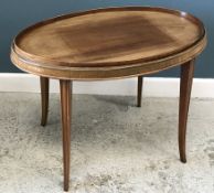 An Edwardian mahogany oval drinks' tray