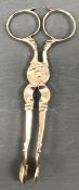 A pair of George III silver scissor acti