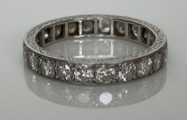 An unmarked white metal mounted diamond