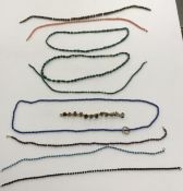 A collection of three malachite bead nec