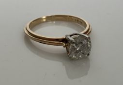A solitaire diamond ring, white metal fo
