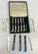 A set of five porcelain pistol grip handled tea knives,