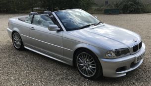 A silver BMW 330ci Sport Convertible 2002, Model E46, Reg. No.