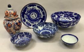 A Japanese Imari domed vase and cover, 24cm high, together with three blue and white bowls of