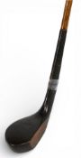 C Brand late scared neck wide body wooden dark stained persimmon head putter stamped with the