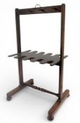 Period Boot Rack / Golf Club Stand: a hardwood stand that has been used as a golf club stand -