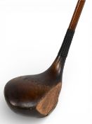 Jack White - Palakona shaft dark stained persimmon brassie with a split brass sole plate to front