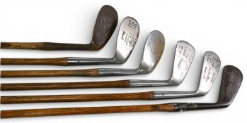 6x Assorted Golf irons incl C Bradbeer mussel back rustless mashie niblick and P4 iron, Anderson