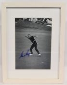 Gary Player signed and framed photograph, frame size 44 x 34 cm