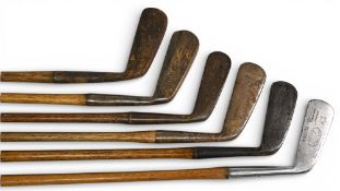 6x Assorted blade putters incl straight line putter showing the Crown and Lion mark, round back