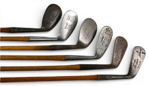 6x Assorted Golf irons incl large head Spalding hammer brand niblick, Tom Lam mussel back mashie