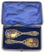 Boxed pair of silver hallmarked 1899 Birmingham, Levi & Salaman Royal Coat of Arms enamelled Spoons,