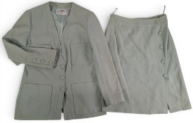 Vintage Chanel Boutique light green Jacket and Skirt, padded shoulders, three buttons to its front