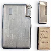 Alfred Dunhill: A Dunhill rollagas pocket cigarette lighter, silver plated with engine turned