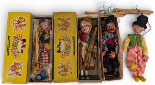 4x Vintage Pelham Puppets, to include boxed examples of a Dutch girl, Gretel, a loose pirate and a