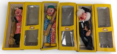 3x Vintage boxed Pelham Puppets, to include a witch, clown, and school master