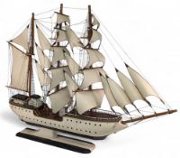 Large and impressive Sailing Ship with white sails and a wooden hull, some loose rigging noted, a