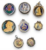 Enamelled Coin Brooches and Fobs: a selection of George IV, Victoria, George VI, in white metal fobs