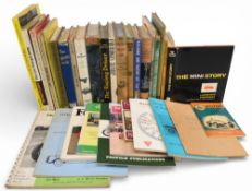 A selection of Motoring themed hardcover and paperback books and publications to include The Mini