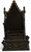 1953 Elizabeth II Coronation Money Box: throne shaped cast iron, made by Harper, 20cm high